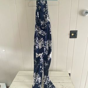 Halter navy and white jumpsuit. Worn once. Material stretchy. Open back